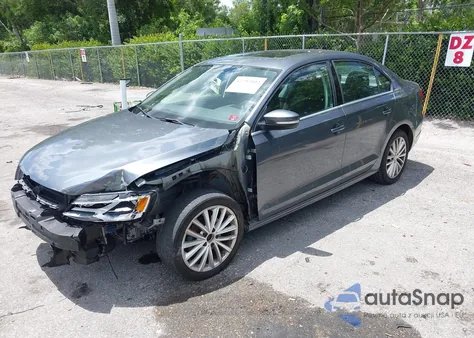 2014 Volkswagen Jetta 1.8T Sel z USA, uszkodzony, nr VIN 3VWL07AJ7EM291823